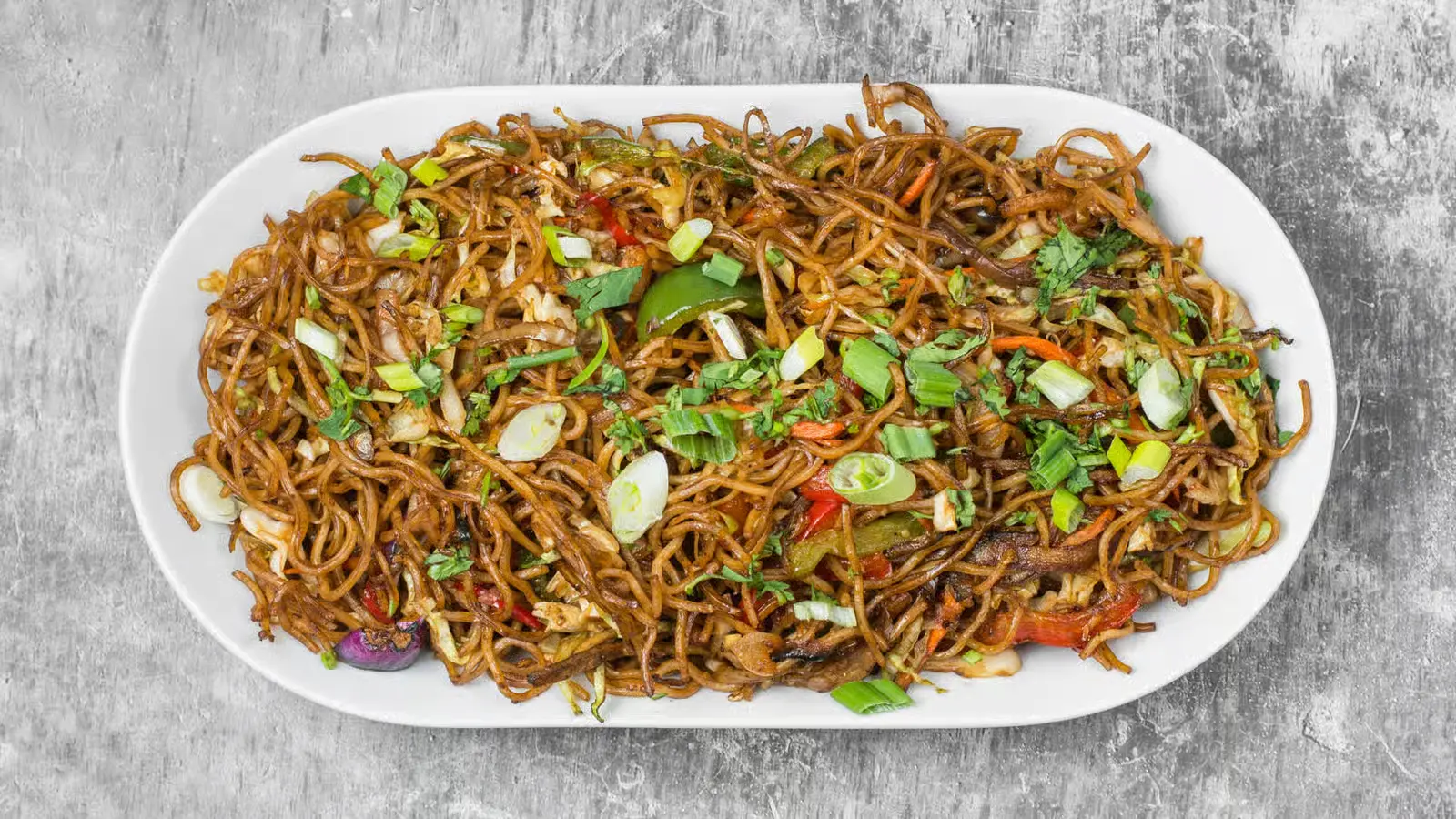 Veg Hakka Noodle at Tandoori Kitchen Edmonton - Indo-Chinese stir-fried noodles with vegetables