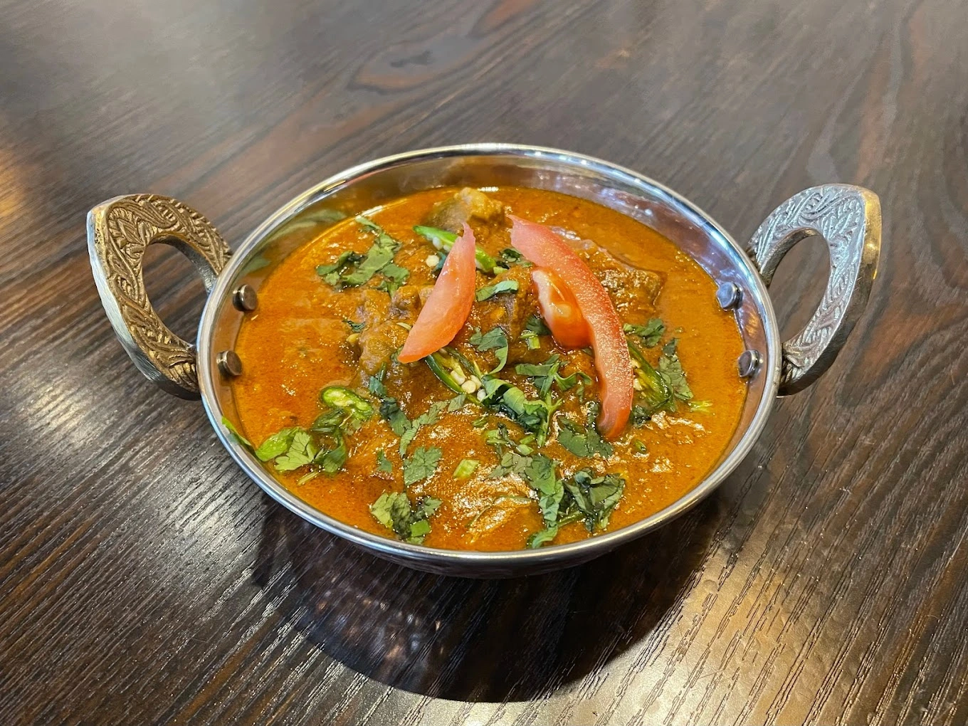 Chicken Tikka Masala at Tandoori Kitchen Edmonton - grilled chicken in rich creamy tomato sauce